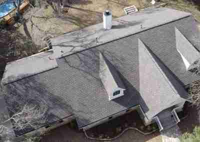 A storm damaged roof that we repaired and then did a full shingle replacement on a home in Leander Texas.