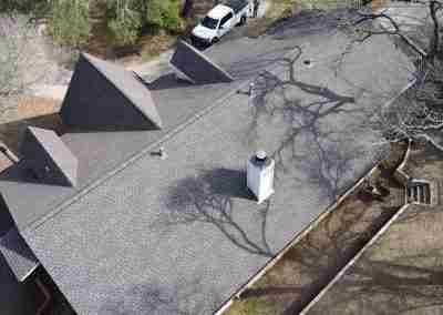 A storm damaged roof that we repaired and then did a full shingle replacement on a home in Leander Texas.