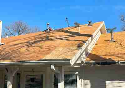 A storm damaged roof that we repaired and then did a full shingle replacement on a home in Leander Texas.