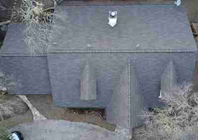 A storm damaged roof that we repaired and then did a full shingle replacement on a home in Leander Texas.