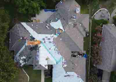 A roof and gutter replacement with the GAF roofing system and Timberline HDZ shingles in Marble Falls Texas