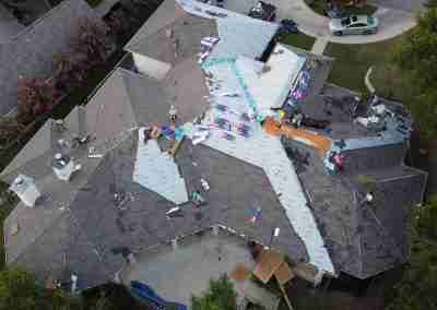 A roof and gutter replacement with the GAF roofing system and Timberline HDZ shingles in Marble Falls Texas