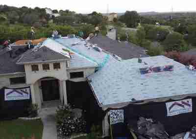 A roof and gutter replacement with the GAF roofing system and Timberline HDZ shingles in Marble Falls Texas