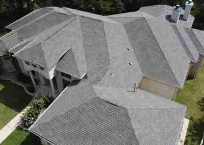 A roof and gutter replacement with the GAF roofing system and Timberline HDZ shingles in Marble Falls Texas