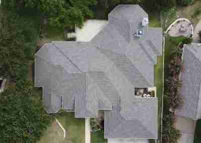 A roof and gutter replacement with the GAF roofing system and Timberline HDZ shingles in Marble Falls Texas