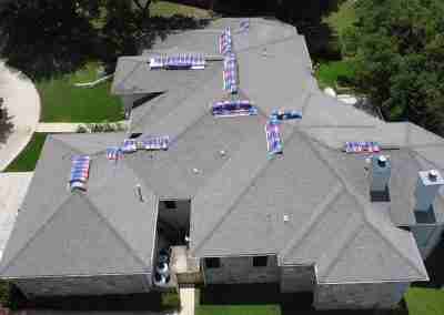 A roof and gutter replacement with the GAF roofing system and Timberline HDZ shingles in Marble Falls Texas