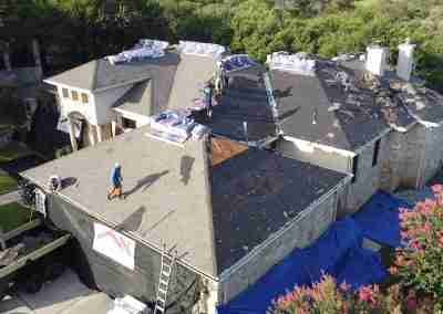 A roof and gutter replacement with the GAF roofing system and Timberline HDZ shingles in Marble Falls Texas
