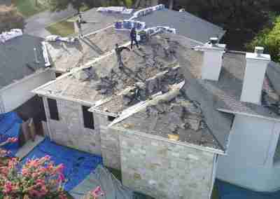 A roof and gutter replacement with the GAF roofing system and Timberline HDZ shingles in Marble Falls Texas