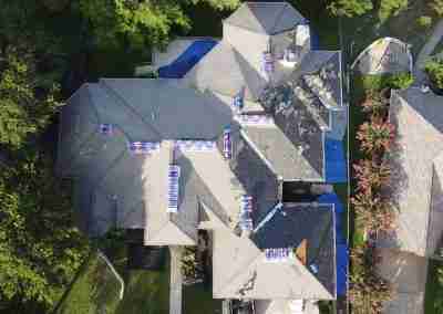 A roof and gutter replacement with the GAF roofing system and Timberline HDZ shingles in Marble Falls Texas