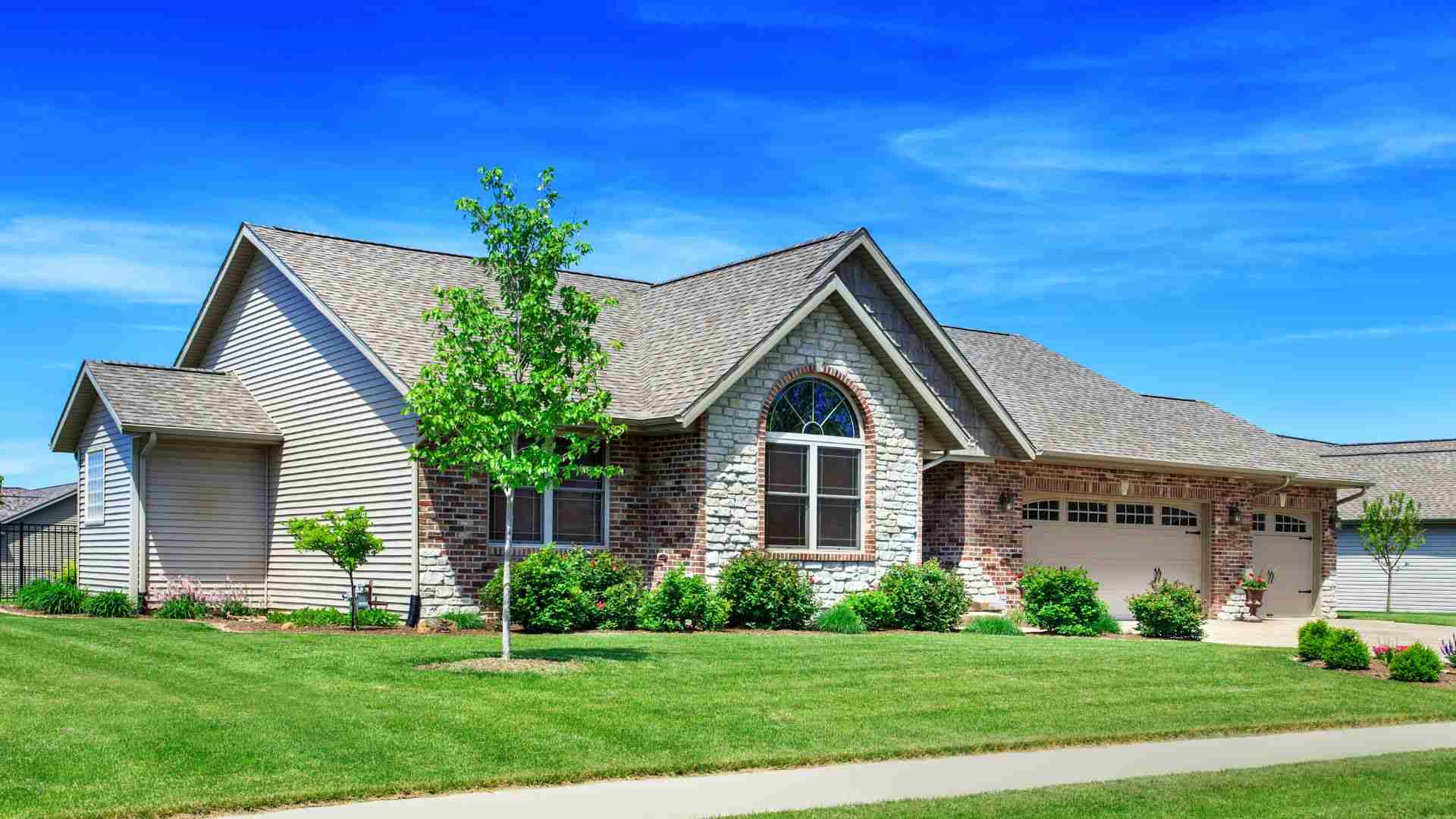 Home in Central Texas with new roofing, siding, gutters and paint