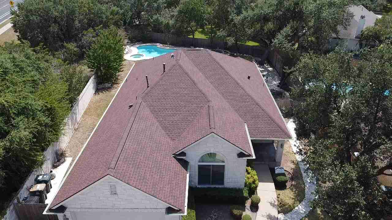 A new roof on a residential home in Austin, Texas using GAF Class 4 Impact Resistant Armor Shield II shingles.