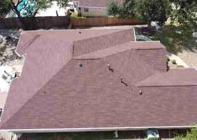 A new roof on a residential home in Austin, Texas using GAF Class 4 Impact Resistant Armor Shield II shingles.
