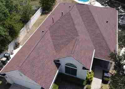 A new roof on a residential home in Austin, Texas using GAF Class 4 Impact Resistant Armor Shield II shingles.