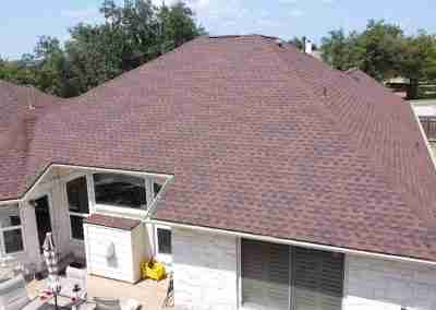 A new roof on a residential home in Austin, Texas using GAF Class 4 Impact Resistant Armor Shield II shingles.