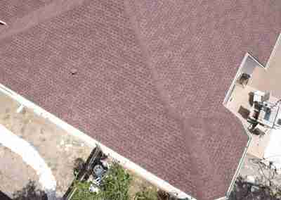 A new roof on a residential home in Austin, Texas using GAF Class 4 Impact Resistant Armor Shield II shingles.