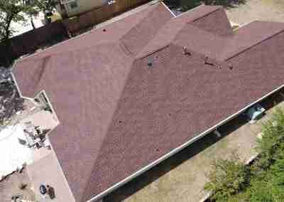A new roof on a residential home in Austin, Texas using GAF Class 4 Impact Resistant Armor Shield II shingles.