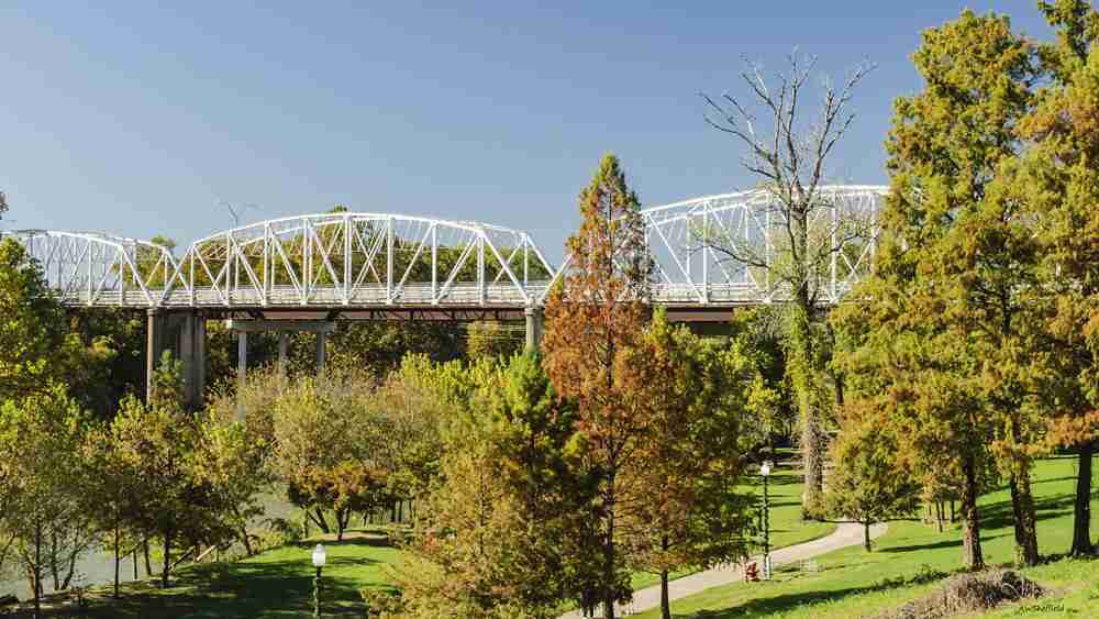 The historic iron bridge over the Coloraco River in Bastrop Texas