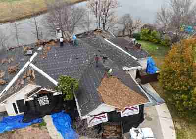 A roof replacement job in Meadowlakes Texas using Euroshield's hail-proof, recycled rubber, Beaumont Shake shingles.
