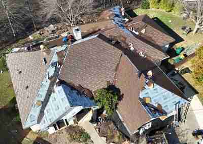 A roof replacement job in Meadowlakes Texas using Euroshield's hail-proof, recycled rubber, Beaumont Shake shingles.