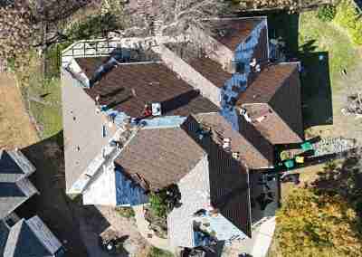 A roof replacement job in Meadowlakes Texas using Euroshield's hail-proof, recycled rubber, Beaumont Shake shingles.