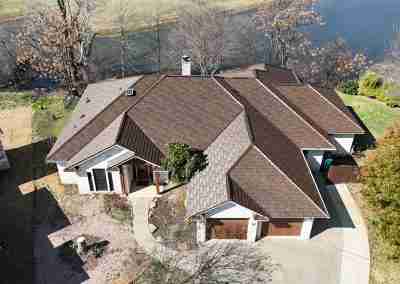 A roof replacement job in Meadowlakes Texas using Euroshield's hail-proof, recycled rubber, Beaumont Shake shingles.