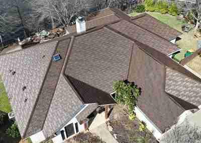A roof replacement job in Meadowlakes Texas using Euroshield's hail-proof, recycled rubber, Beaumont Shake shingles.