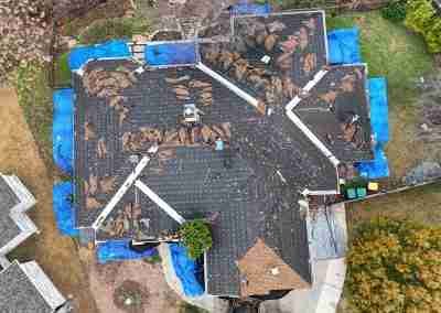 A roof replacement job in Meadowlakes Texas using Euroshield's hail-proof, recycled rubber, Beaumont Shake shingles.