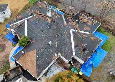 A roof replacement job in Meadowlakes Texas using Euroshield's hail-proof, recycled rubber, Beaumont Shake shingles.