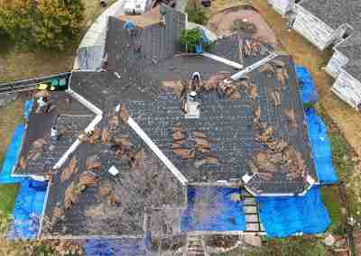 A roof replacement job in Meadowlakes Texas using Euroshield's hail-proof, recycled rubber, Beaumont Shake shingles.