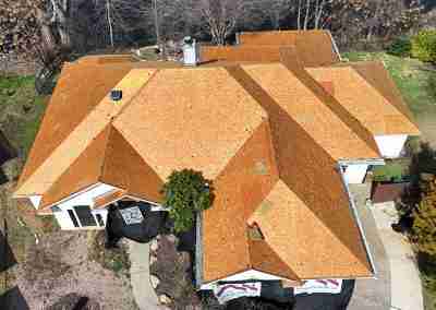 A roof replacement job in Meadowlakes Texas using Euroshield's hail-proof, recycled rubber, Beaumont Shake shingles.