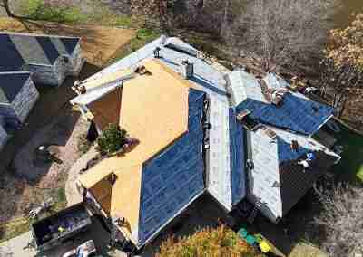 A roof replacement job in Meadowlakes Texas using Euroshield's hail-proof, recycled rubber, Beaumont Shake shingles.