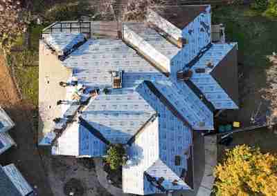 A roof replacement job in Meadowlakes Texas using Euroshield's hail-proof, recycled rubber, Beaumont Shake shingles.