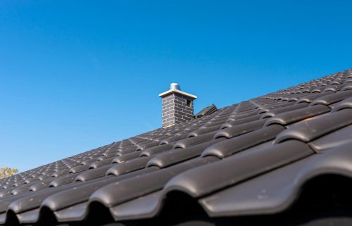 the-roof-of-a-single-family-house-covered-with-a-new-ceramic-tile-in-anthracite.jpg